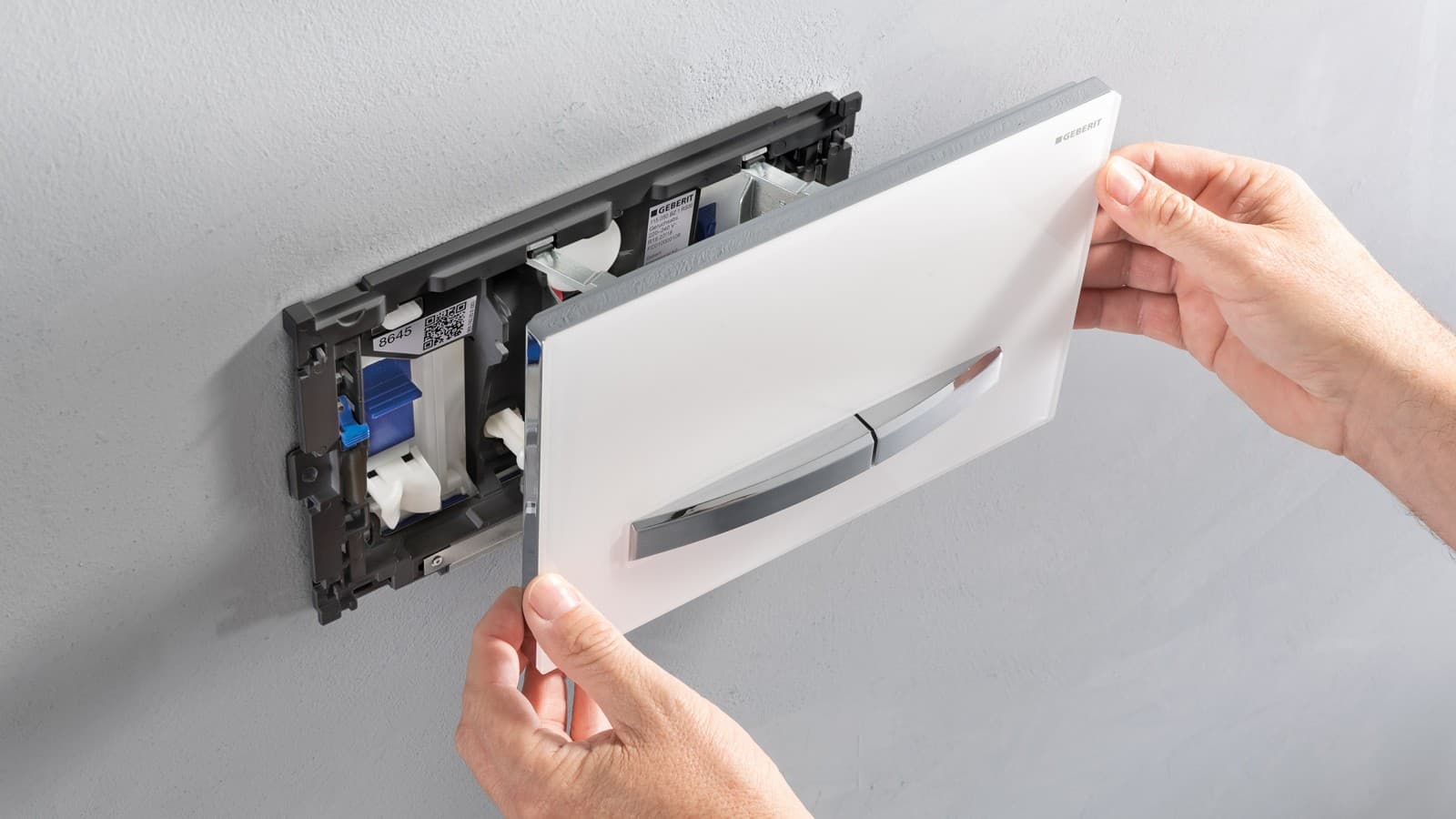 Pllakë shpëlarjeje Geberit me ndarje për bllok në cisternë Pllakë shpëlarjeje Geberit me ndarje për bllok në cisternë